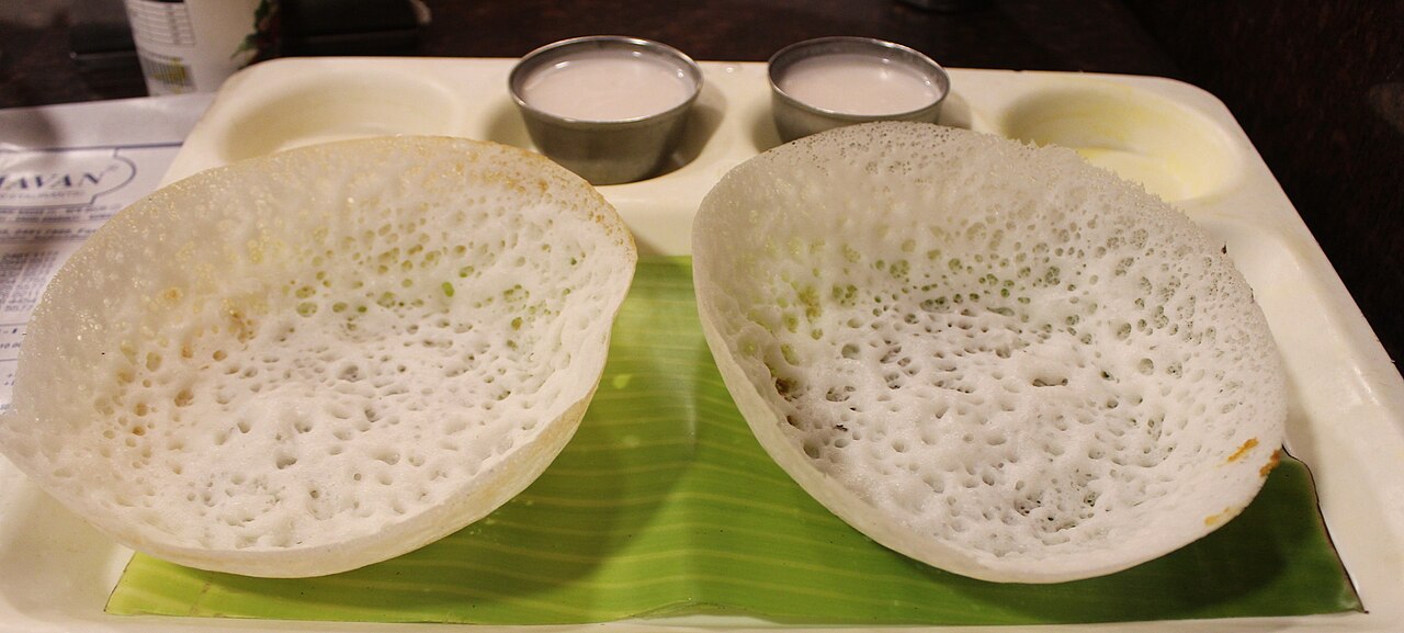 Plain appam with coconut milk