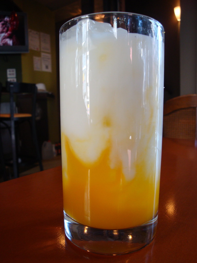 Mango lassi topped with pistachio